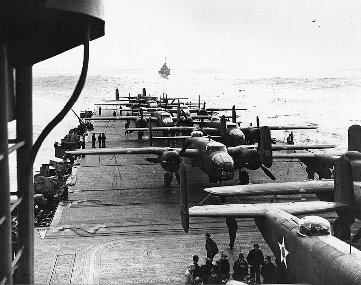 B-25B Mitchell medium bombers on the flight deck of USS Hornet heading towards Japan, April 1942 [Public domain, wiki]