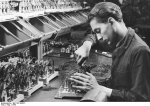 French mechanic working at a Siemens factory in Germany, 1943 [Bundesarchiv, Bild 183-S68015, wiki]