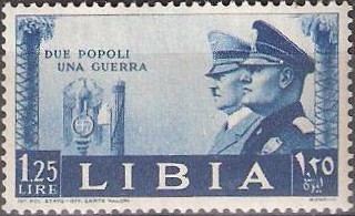 Mussolini/Hitler postage stamp from Libya, issued 1941 [Public domain]