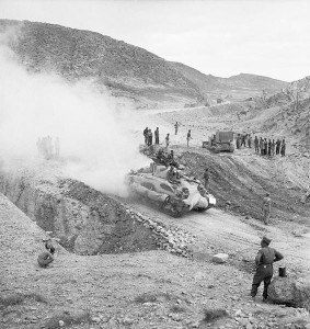 Sherman tanks of the British Eight Army's 9th Lancers advance through the Gabes gap, Tunisia, 7 April 1943 [Public domain, IWM]