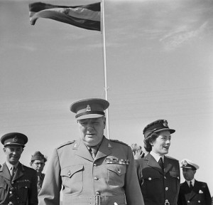 Winston Churchill (in the uniform of his old regiment, the 4th Queen's Own Hussars) and his daughter, Sarah, in Egypt for the Second Cairo Conference, 5 December 1943 [Public domain]