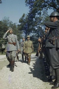 HRH Prince Umberto inspecting a guard of honour during his visit to the Italian Corps of Liberation, Sparanise, Italy 1944 [Public domain]