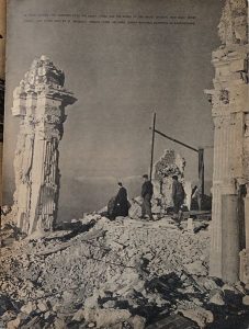 Photograph that appeared in 'Yank, the Army Weekly' showing a monk guiding two soldiers over the ruins of Monte Cassino abbey [Public domain]