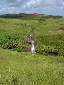 A stream flows down from the highlands of Guam in the Marianas [Author: David Burdick, Public domain]