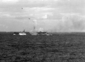 US Navy escort carrier under attack by Japanese aircraft during the Battle of Leyte Gulf, 25 Oct 1944 [Public domain]