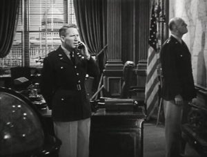 Spencer Tracy (left) as Colonel James Doolittle in the movie Thirty Seconds Over Tokyo [Public domain]