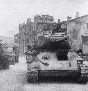 Soviet T34 tank entering Minsk, early July 1944 [Public domain]