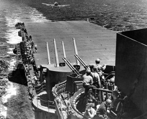 Grumman F6F-3 Hellcat fighter returning to the USS Lexington (Flagship of Task Force 58) June, 1944 [Public domain]